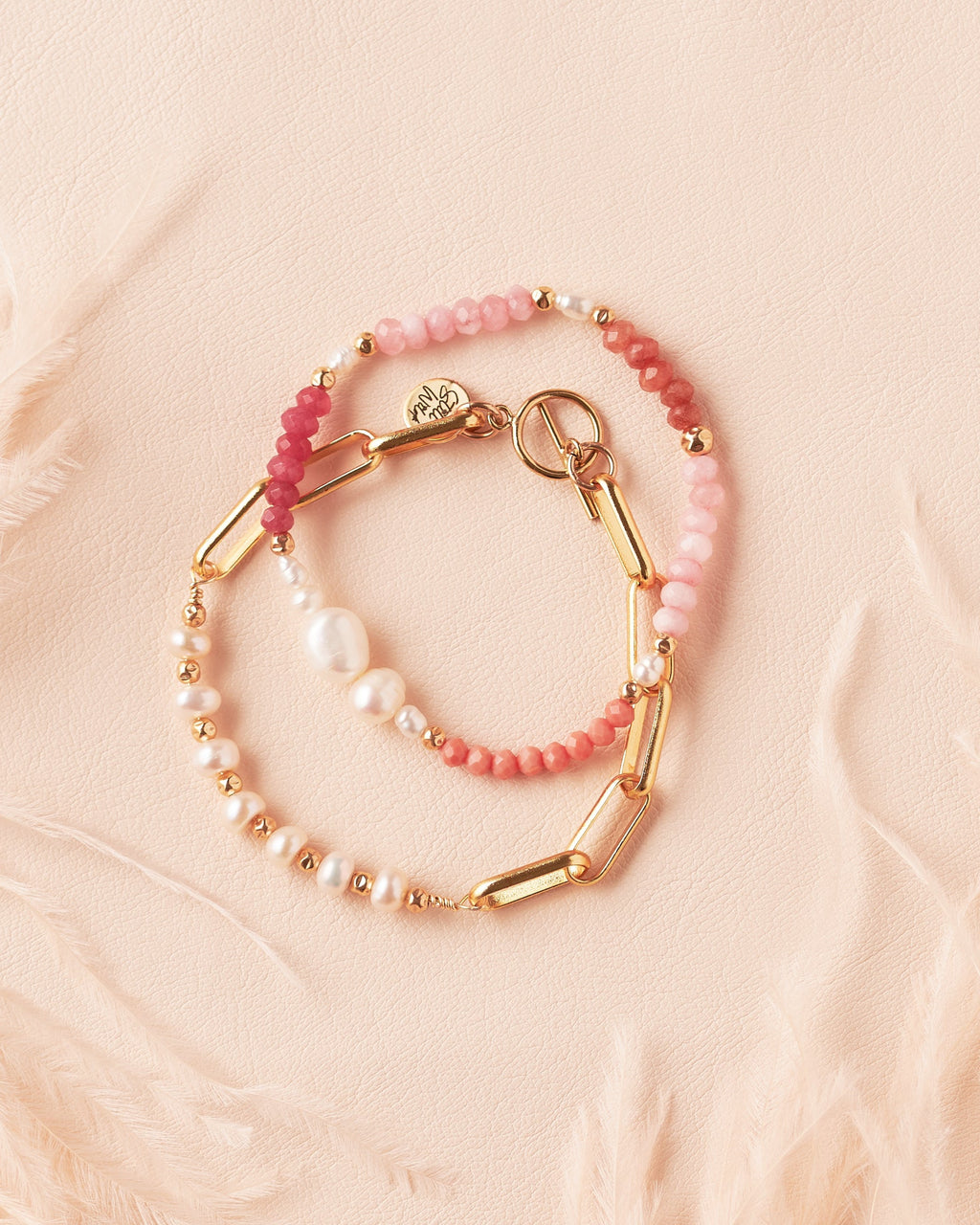 Ombre Bracelet in Rosé featuring rose jade, terracotta, and golden-filled semiprecious stones with gold-filled beads and a freshwater pearl centrepiece, and radiance bracelet (freshwater pearls, gold filled beads and bold gold filled paperclip chain)