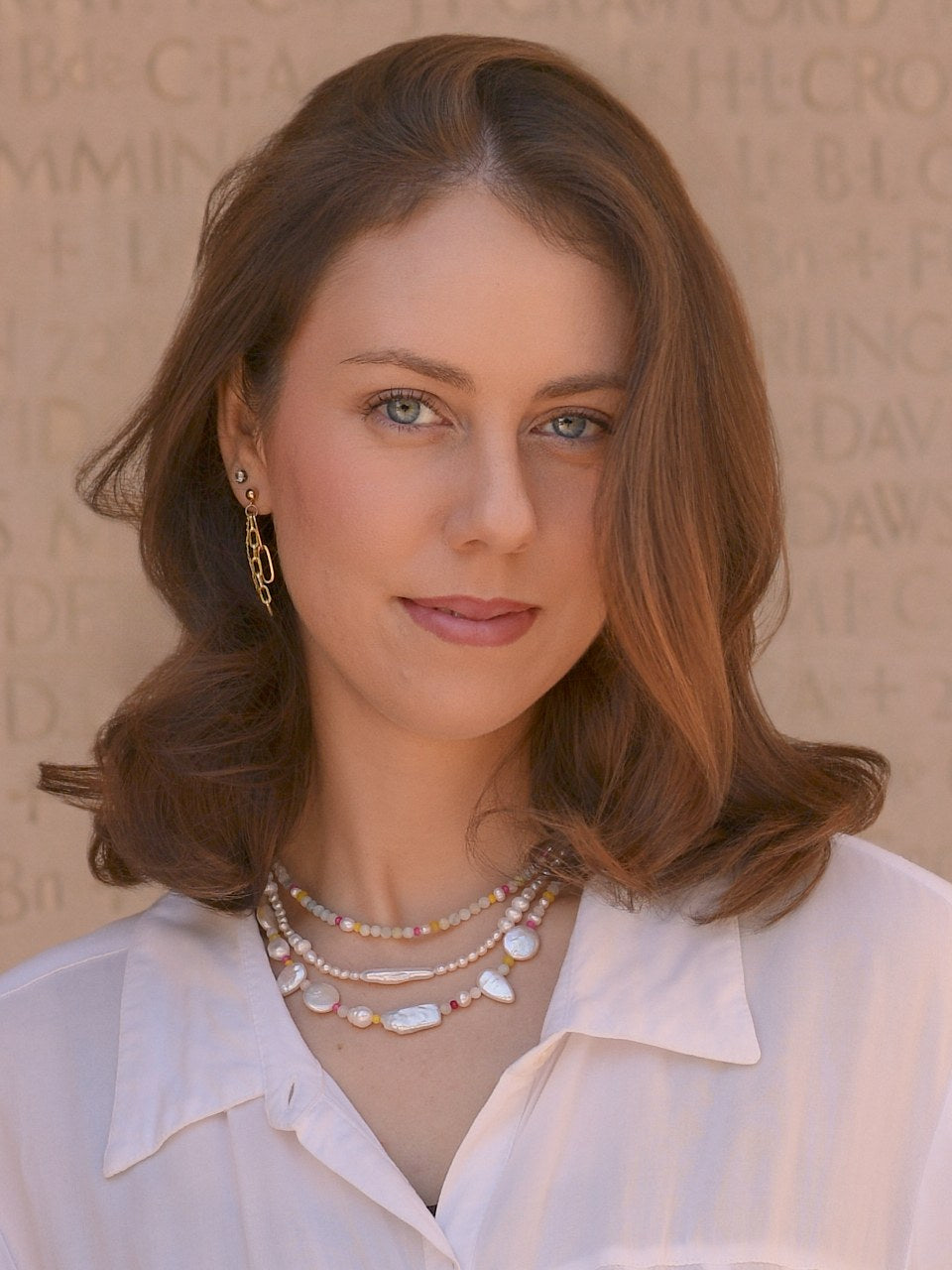 Untamed Necklace layered with the Dreamer and Reverie necklaces, worn with a white shirt